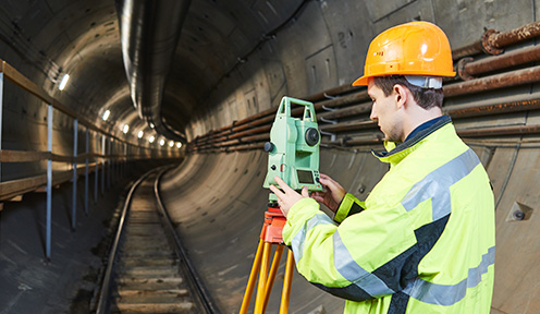 Surveyor with specialist equipment completing am underground drainage survey